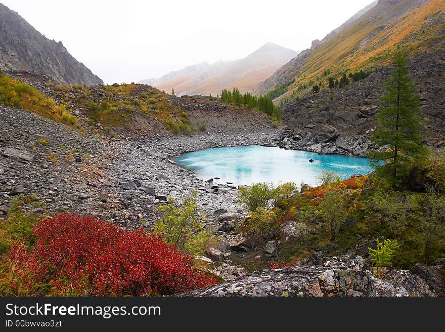 Turquoise lake and mountains.