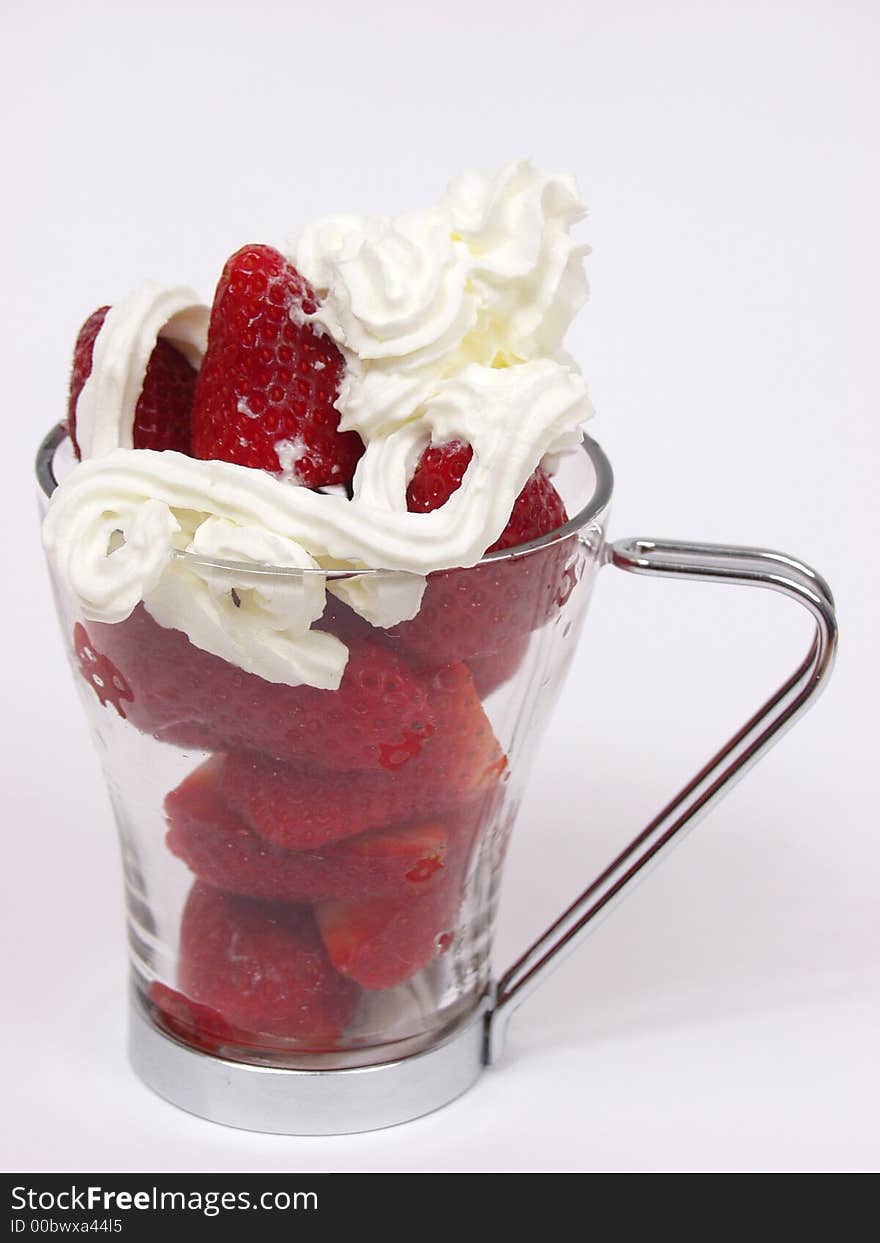 A glass cup with red valentines strawberry