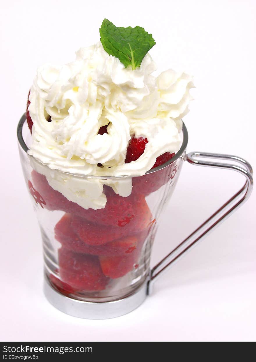 A glass cup with red valentines strawberry