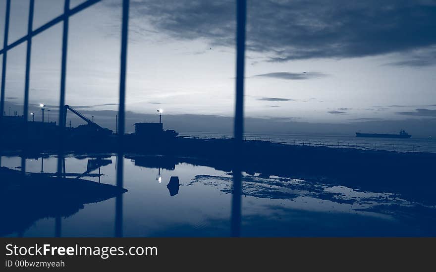 Coastline landscape with a boat on the horizon