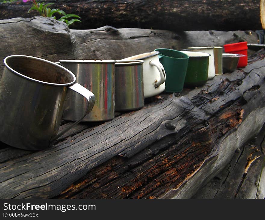 A row of a different mugs. A row of a different mugs