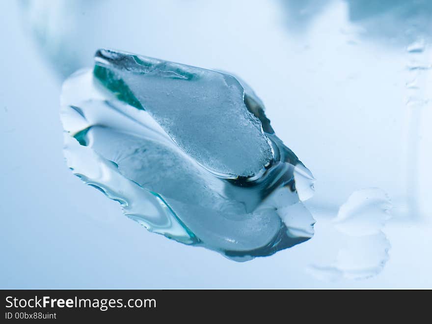 Ice cubes on a reflective surface