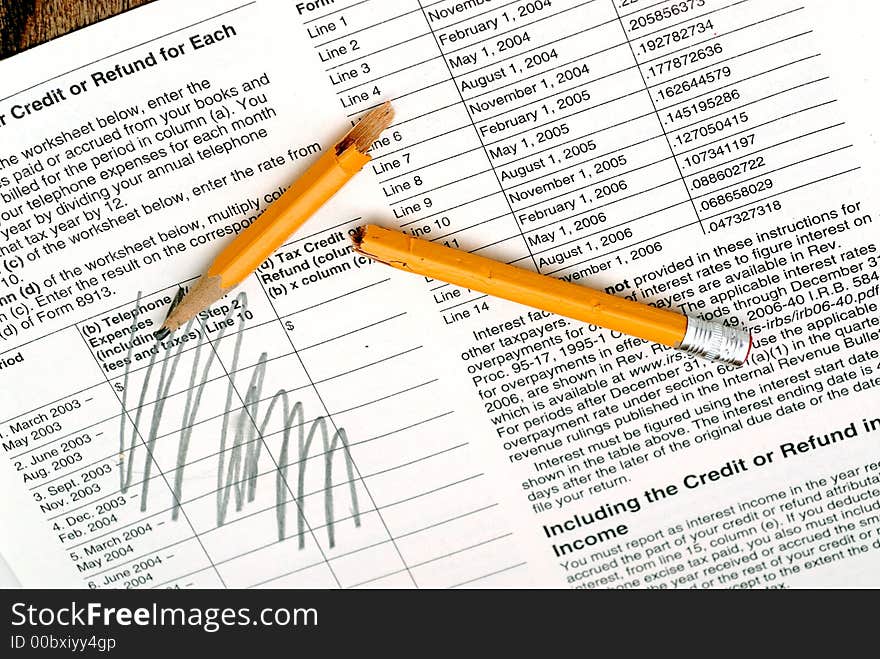 Tax form with pencil marks showing frustration. Tax form with pencil marks showing frustration