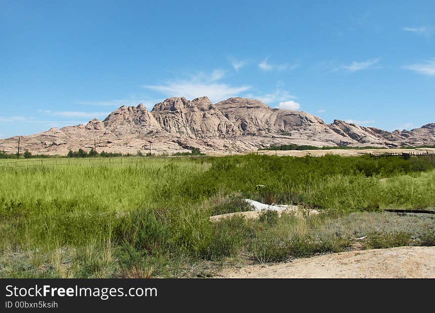 The height of mountain is equal 750 meters. Granite monolith.