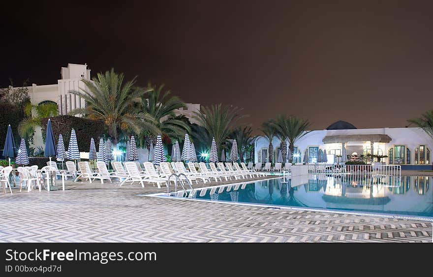 Photo of huge swimming pool at night. Photo of huge swimming pool at night