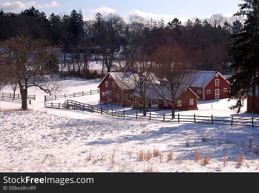 A light snow covers the fields and barn at Huber Woods Park, Middletown, NJ. A light snow covers the fields and barn at Huber Woods Park, Middletown, NJ