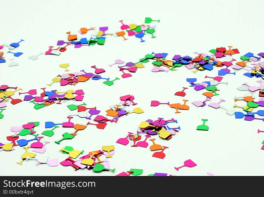 Multicolored confetti on white background. Multicolored confetti on white background.