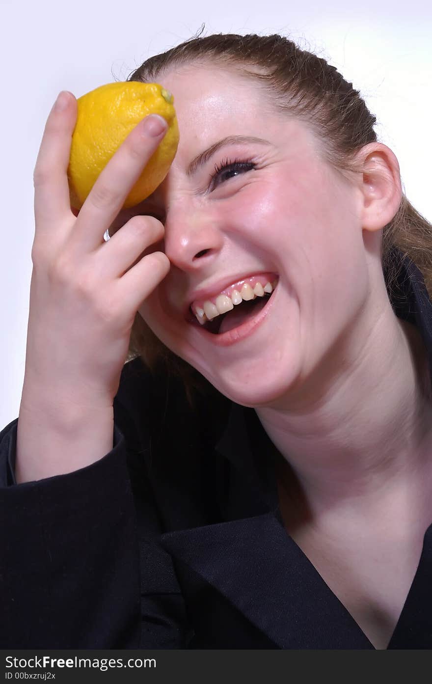 The girl with a lemon in the hand