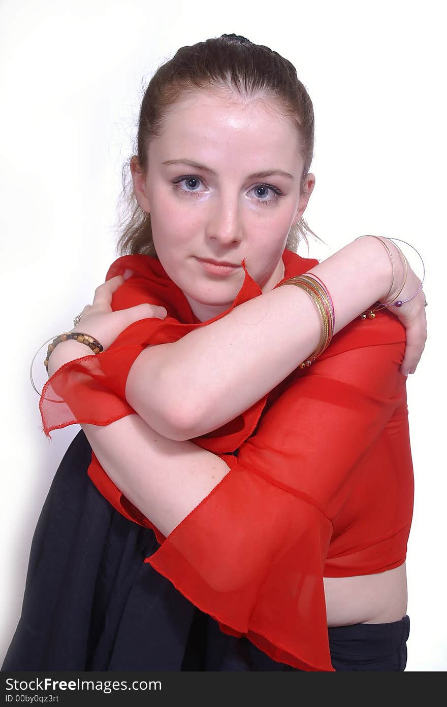 The portrait of a   girl in the red blouse