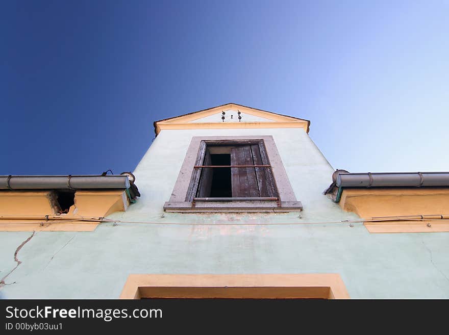 Picture of a fall into ruin building in Linz, Austria with nice pastel coloured fasade. Picture of a fall into ruin building in Linz, Austria with nice pastel coloured fasade.