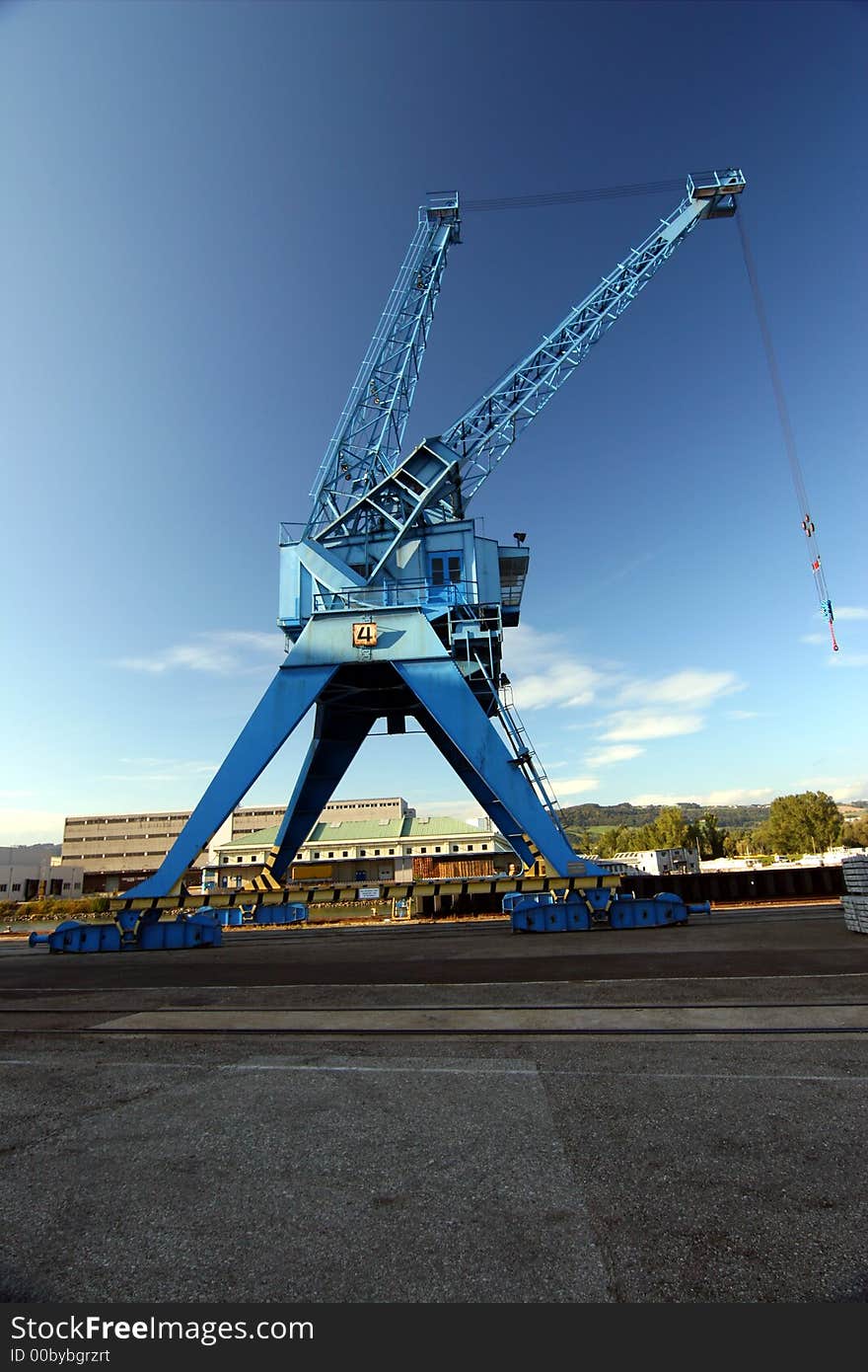 Port crane in Linz, Austria. Huge crane used to clear ships to boxcars at the Danube river. Port crane in Linz, Austria. Huge crane used to clear ships to boxcars at the Danube river.