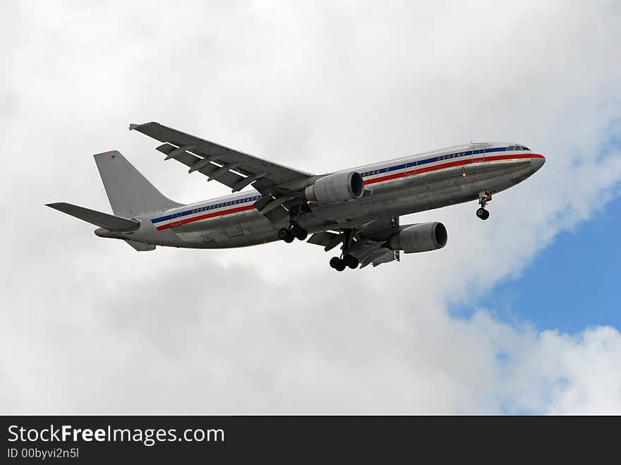 Heavy jetliner approaching airport for landing. Heavy jetliner approaching airport for landing