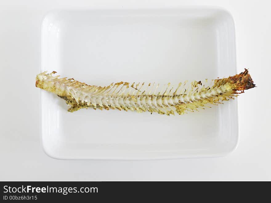 Fishbone on the white plate