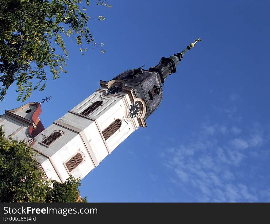 Sombor catholic church tower on the blue sky. Sombor catholic church tower on the blue sky