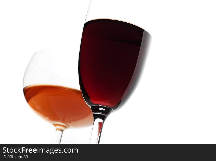 Two glass of red and pink wine. Isolated white. Two glass of red and pink wine. Isolated white.