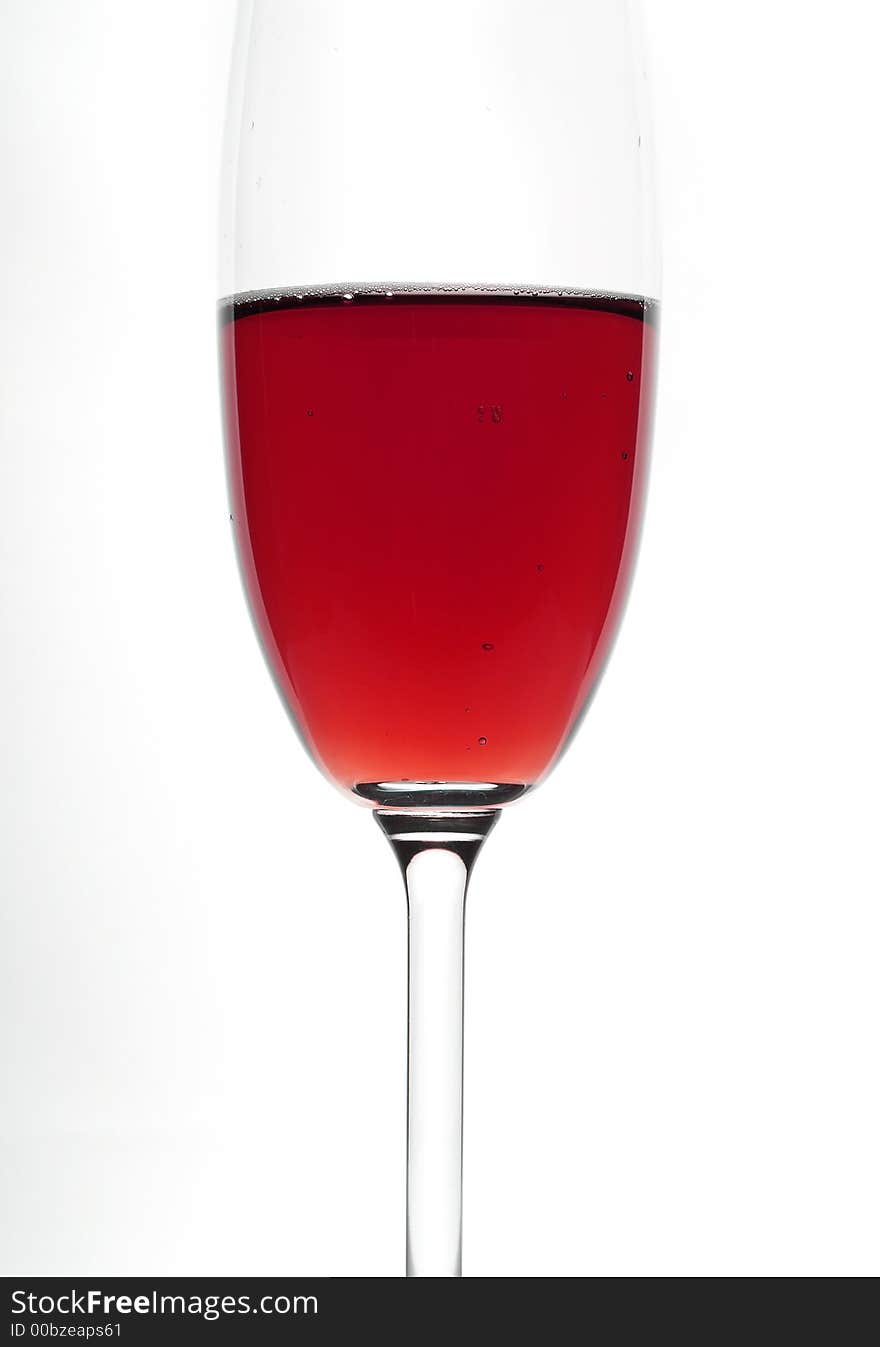 Glass of red wine. Isolated white. Close-up. Glass of red wine. Isolated white. Close-up.