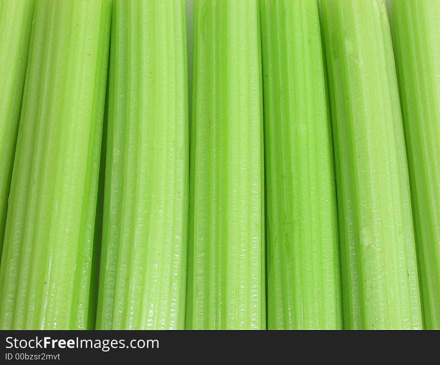 Fresh green cerely stem on white background