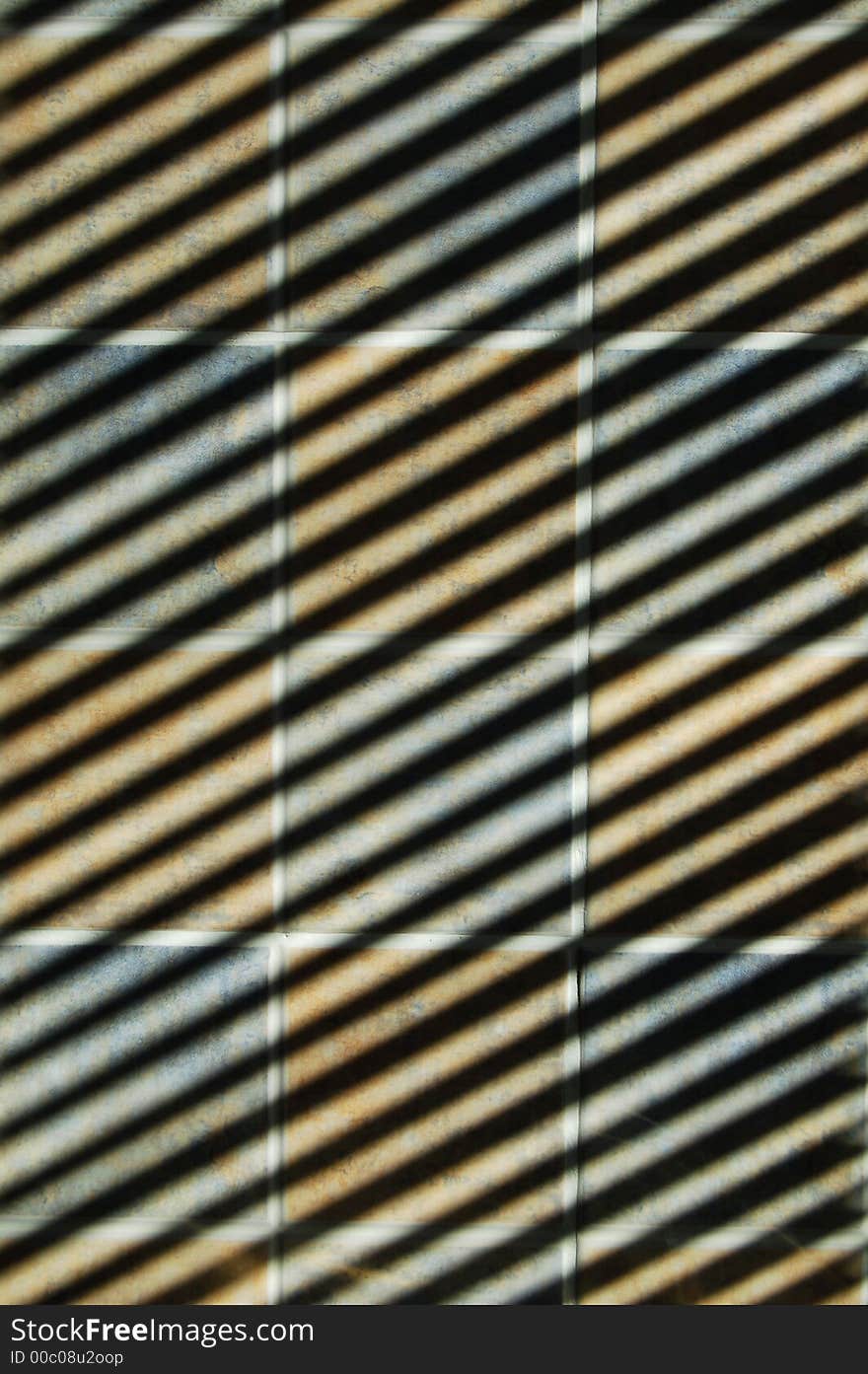 Shadow of blinds falling on kitchen tiles. Shadow of blinds falling on kitchen tiles