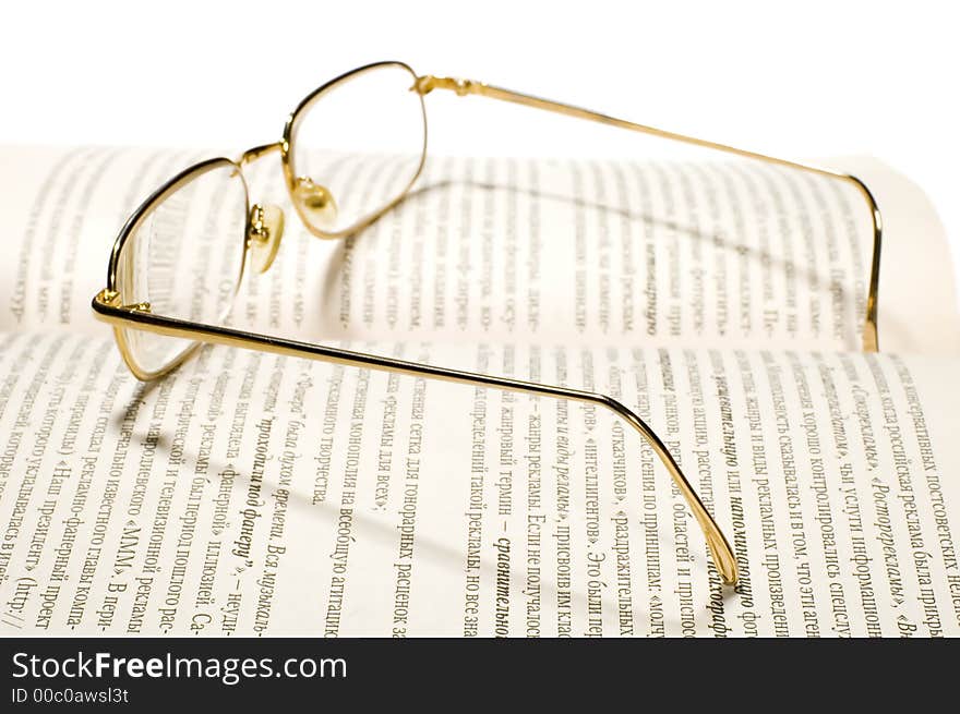 Series object on white: isolated -Book with glasses. Series object on white: isolated -Book with glasses