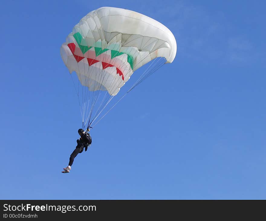 Parachuter And Clouds