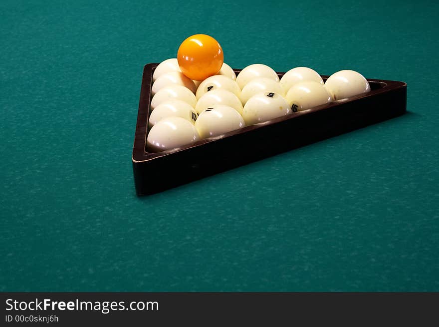 Billiard spheres in a triangle on a table