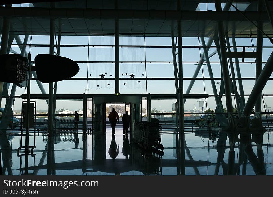 Reflex of people at the airport door. Reflex of people at the airport door