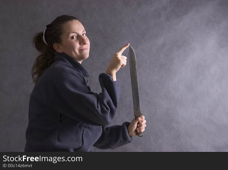 Girl with very big knife. Girl with very big knife