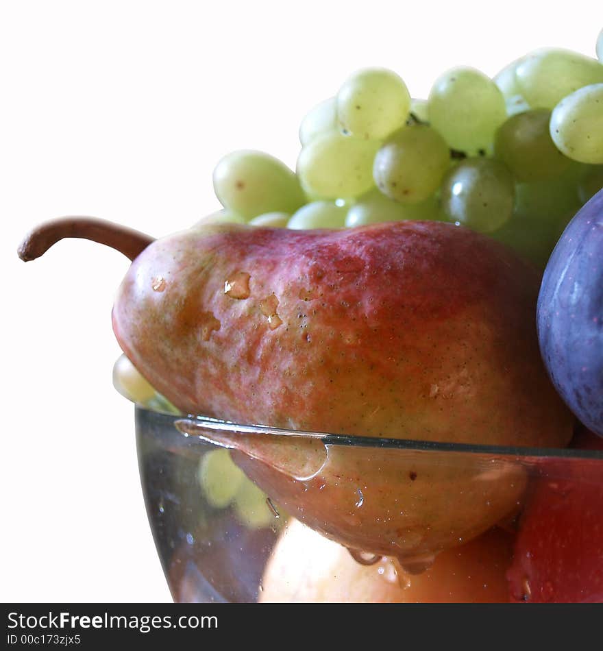 Isolated fruit-piece with the bunch of grapes, apple and fig. Isolated fruit-piece with the bunch of grapes, apple and fig