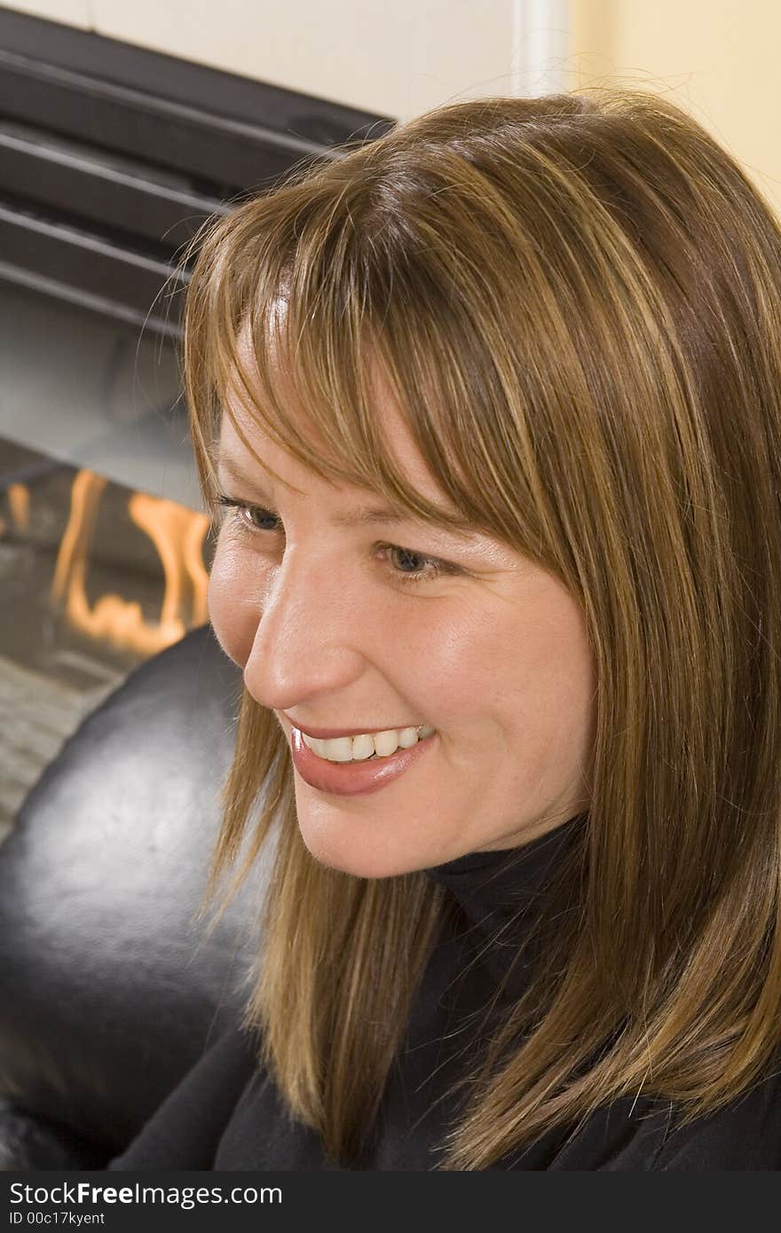 Portrait of a woman sitting on couch