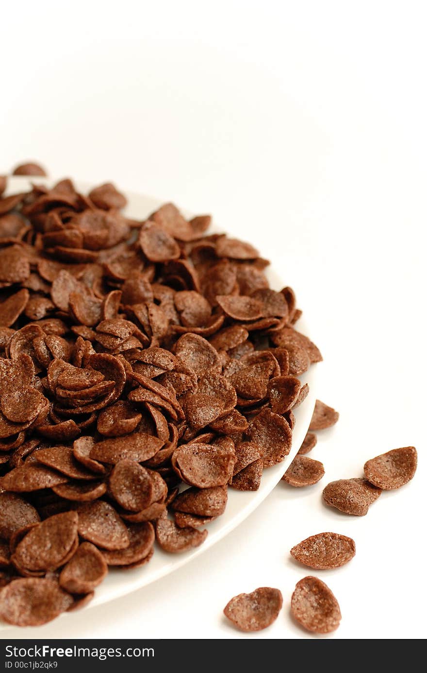 Chocolate cornflakes and white background