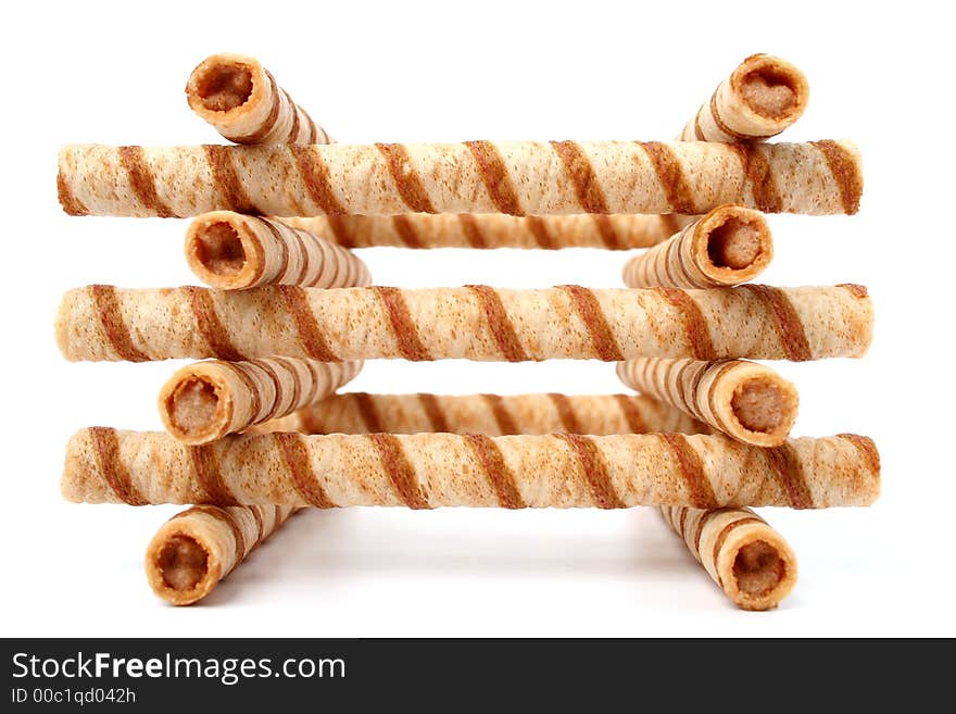 Stop of striped wafer tubules with the chocolate cream, isolated 6, (look similar images in my portfolio). Stop of striped wafer tubules with the chocolate cream, isolated 6, (look similar images in my portfolio)