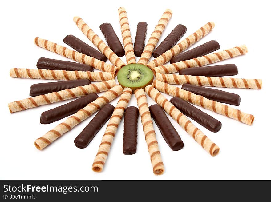 Vanilla chocolate sticks with a cream and sliced kiwi