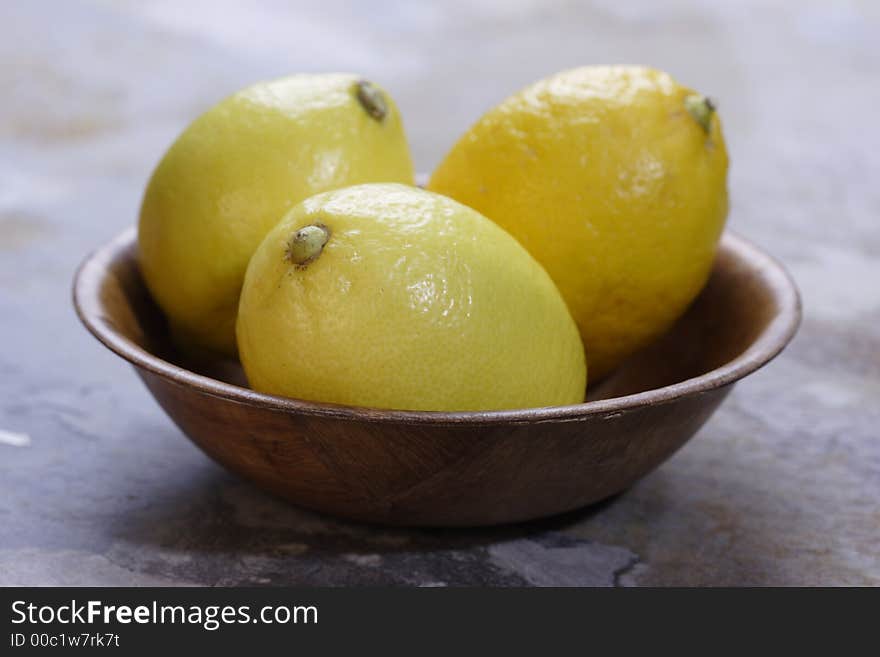 Bowl with lemons, fresh and tasty