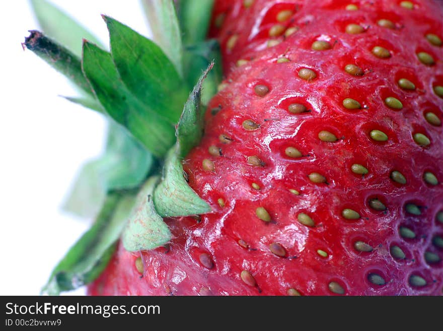 Red strawberry closeup. Macro. Isollated. Red strawberry closeup. Macro. Isollated