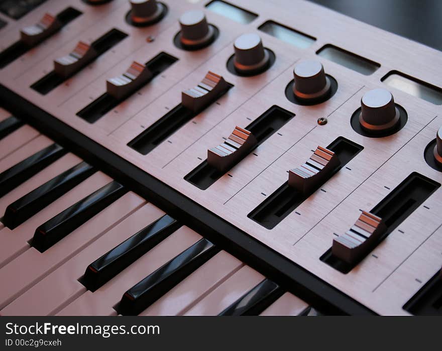 Close-up of a professional usb midi controller. Close-up of a professional usb midi controller.