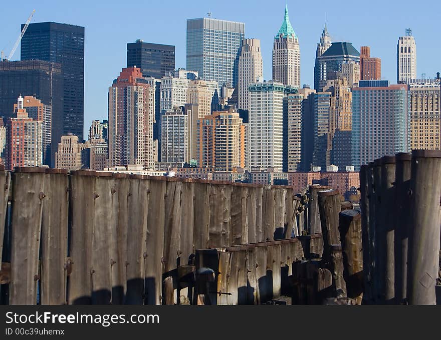 New York Skyline with old pilings in the foreground. New York Skyline with old pilings in the foreground.