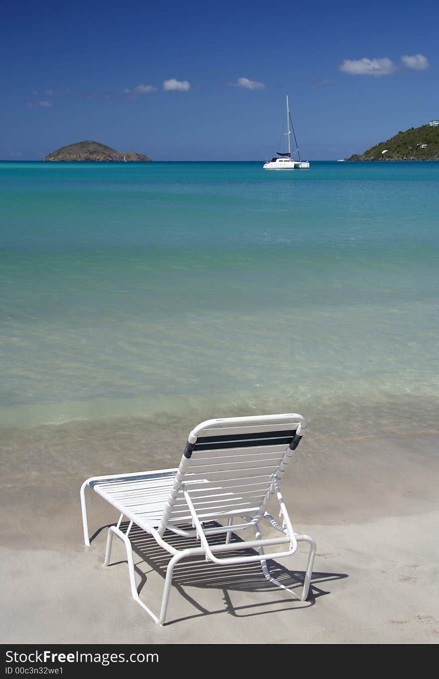 Deck chair on a caribbean beach. Deck chair on a caribbean beach