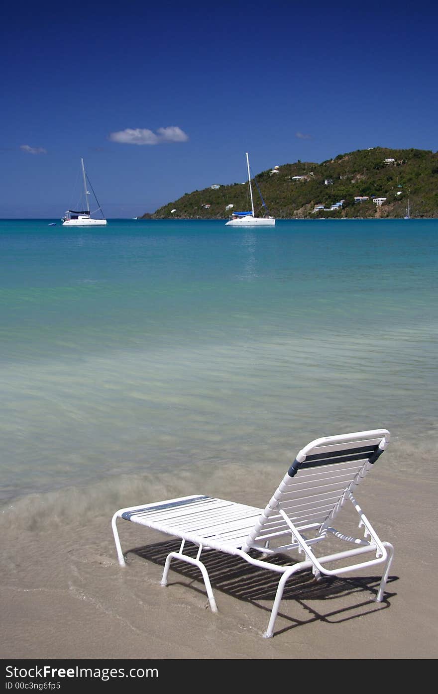 Deck chair on a caribbean beach. Deck chair on a caribbean beach