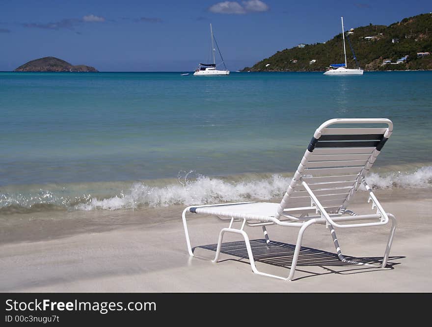 Deck chair on a caribbean beach. Deck chair on a caribbean beach