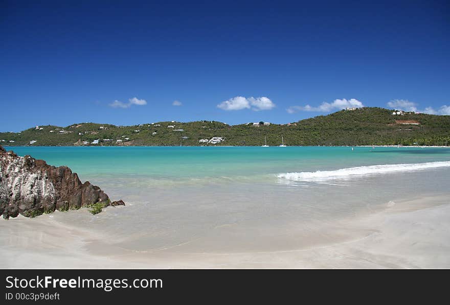 Beautiful caribbean beach with splashing waves. Beautiful caribbean beach with splashing waves