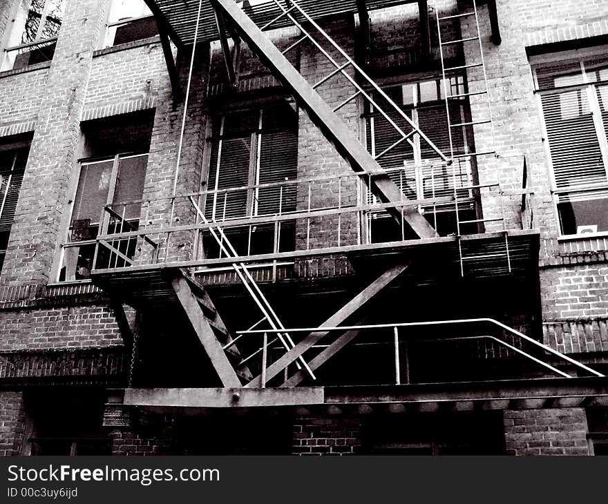 Old fire escape on a tattered college building. Old fire escape on a tattered college building