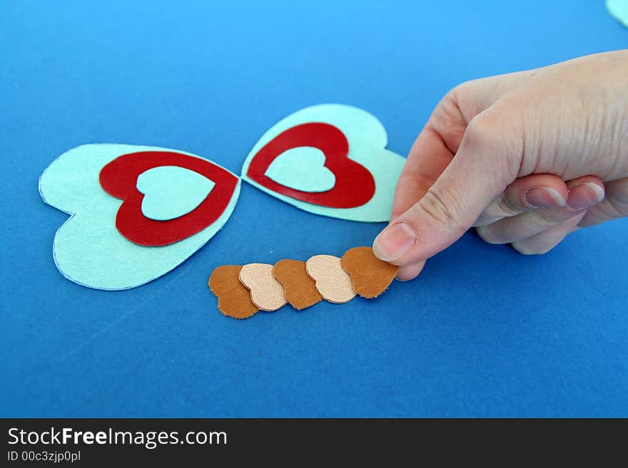 Different sized hearts in shape of a butterfly. Different sized hearts in shape of a butterfly