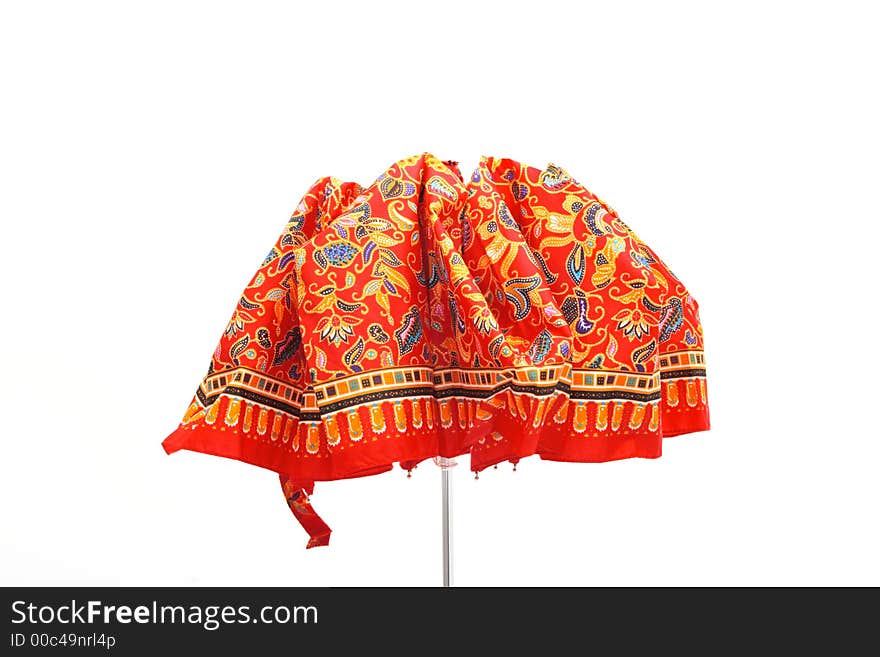 Colorful umbrella helps against rain and sun