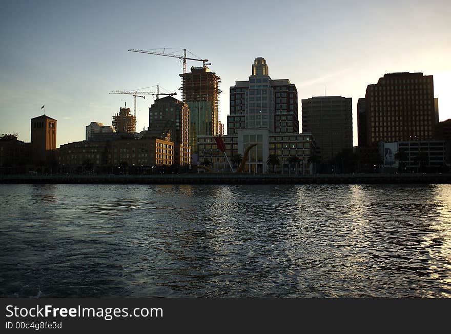 Cityscape of San Francisco from the bay with modern buildings. Cityscape of San Francisco from the bay with modern buildings.