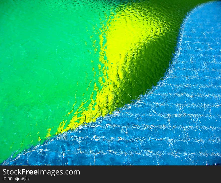 Three colors in a pool with surface wind patterns and tiles. Three colors in a pool with surface wind patterns and tiles