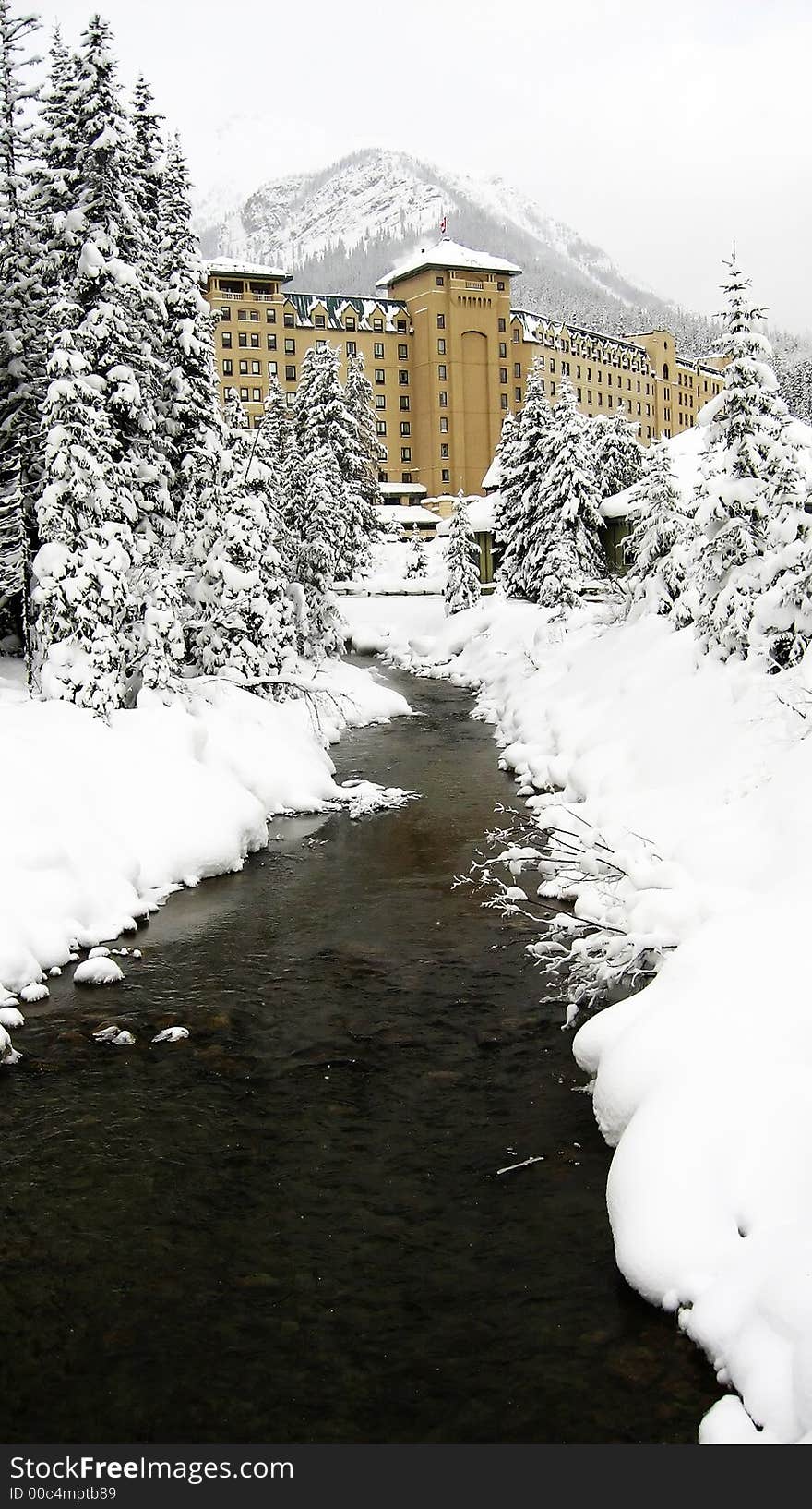 A river draining towards a secluded hotel