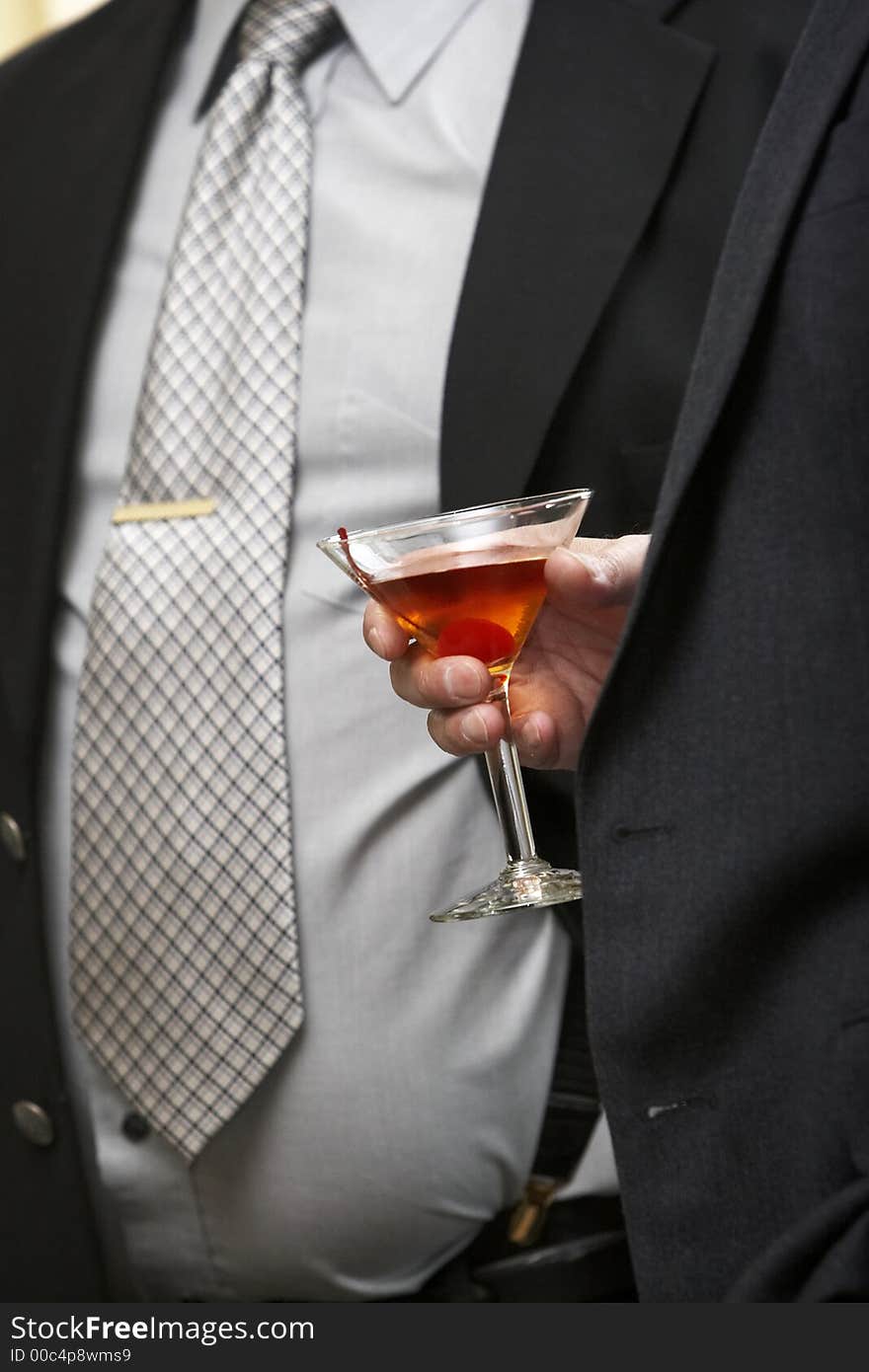 A martini being held by a man