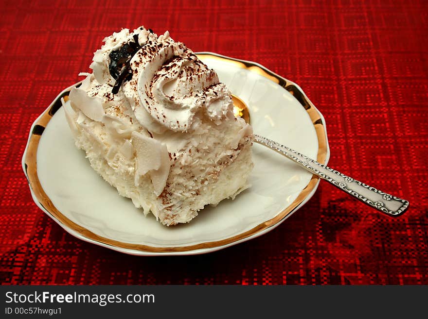 Slice Of A Pie With A Cream On A Red Background