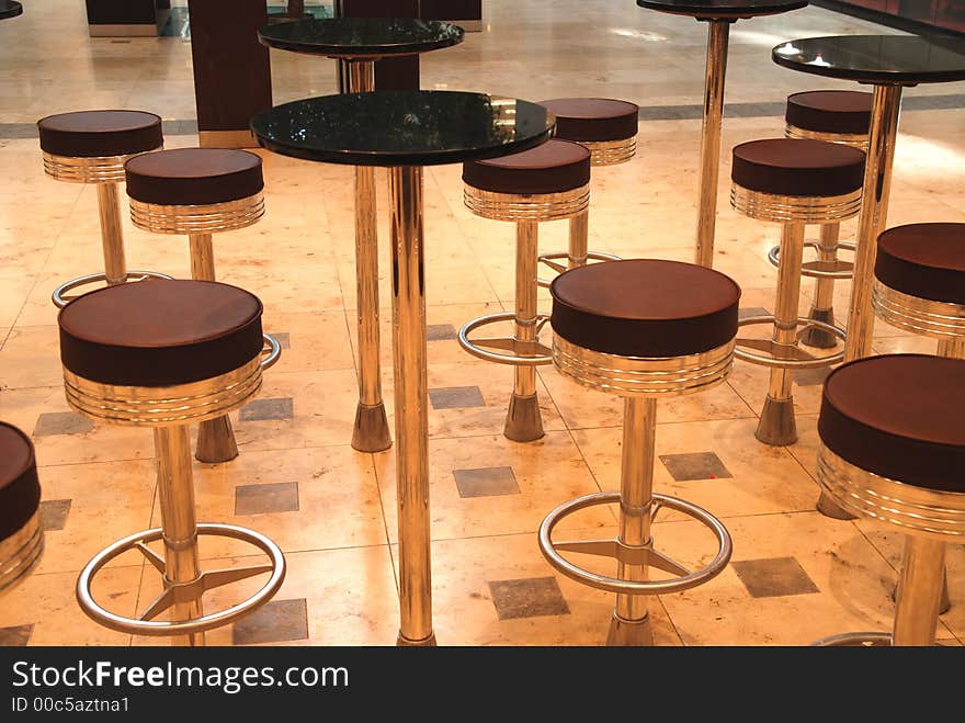 Stools and tables in a cafe