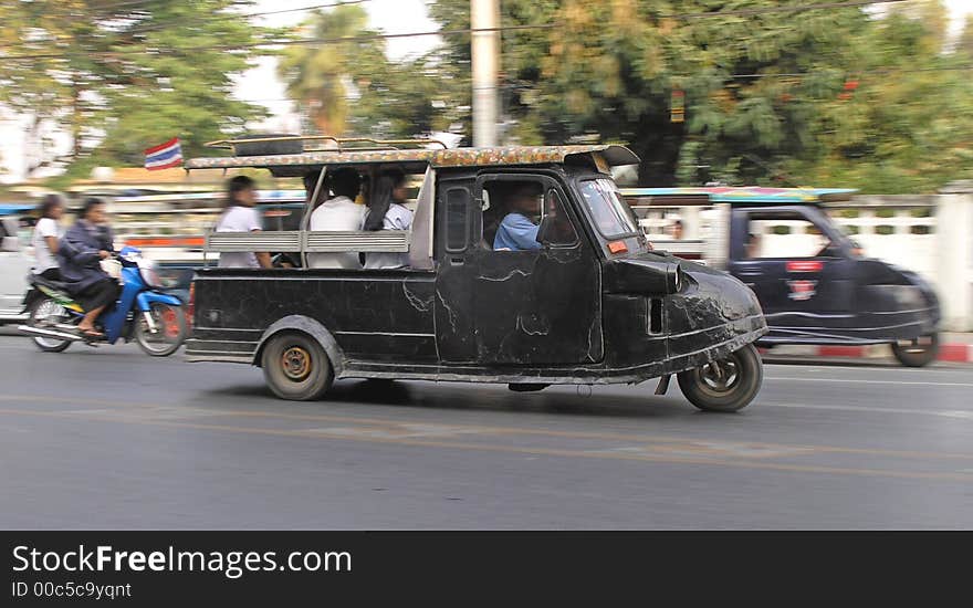 black tuk tuk   taxi on the road thailand